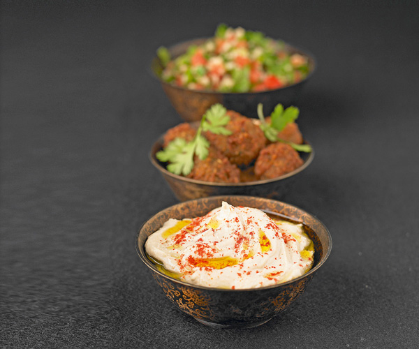 Oriental recipe mezze platter, eggplant caviar, kebbes and salad